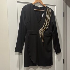 Elegant Black Dress with Gold Chain Detail